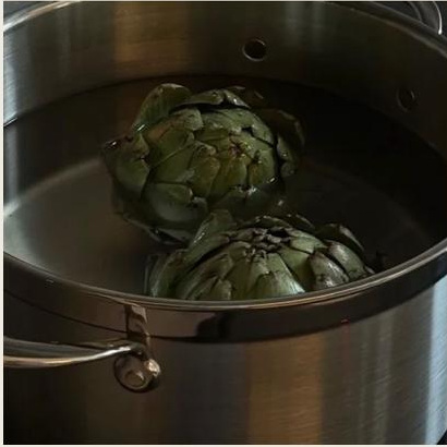 Artichokes in a steel pot